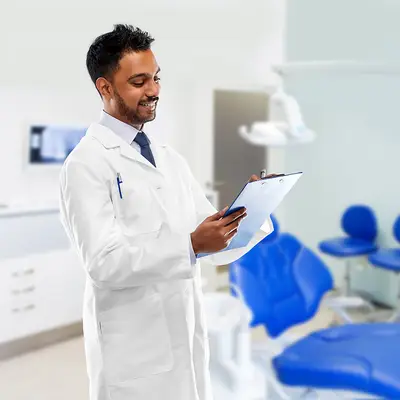 Dentist reassuring a patient at Laasya Dental in Visakhapatnam